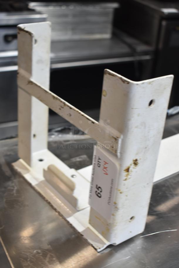 White metal piece with visible wear, potentially part of a larger item set. Tagged with auction number 59.