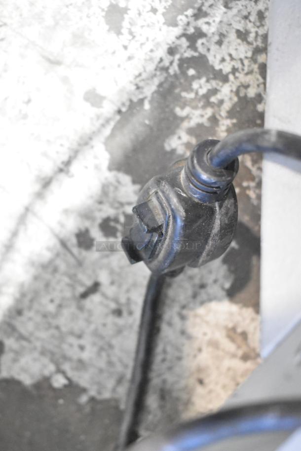 Power cord of Lamda Commercial Countertop Vegetable/Cheese Cutter, 115 Volts, 1 Phase; condition used.