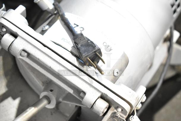 Lamda Commercial Vegetable/Cheese Cutter, 115V, 1 Phase. Close-up of plug and mounting bracket.