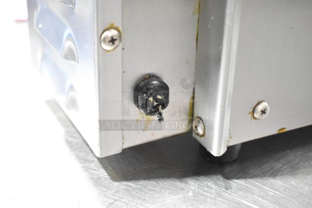 Hobart ET-13/4 countertop toaster, 2-slot, stainless steel, visible wear, 115 volts, 1 phase, worn power switch.