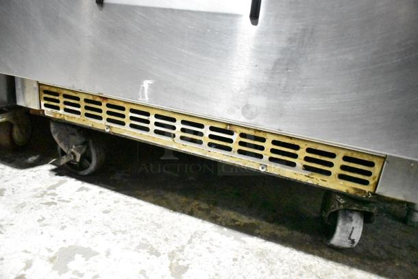 True Commercial Sandwich Salad Prep Table Bain Marie Mega Top, featuring 2 drawers on casters, in fair condition. 115V, 1 Phase.