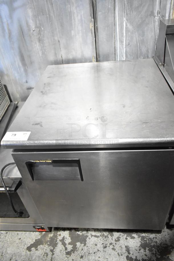 Everest ETBR1 single door undercounter cooler on commercial casters; stainless steel; 115V, 1 Phase; shows signs of use.