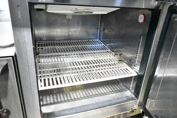 Everest ETBR1 Commercial Single Door Undercounter Cooler, stainless steel, on casters, 115V, visible wire shelving.
