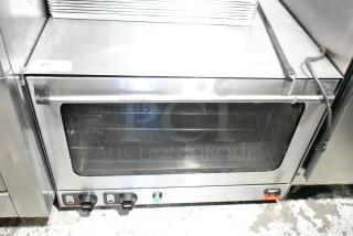 Vollrath Cayenne Countertop Convection Oven, stainless steel, 115 volts, 1 phase, with control knobs, clear glass door.