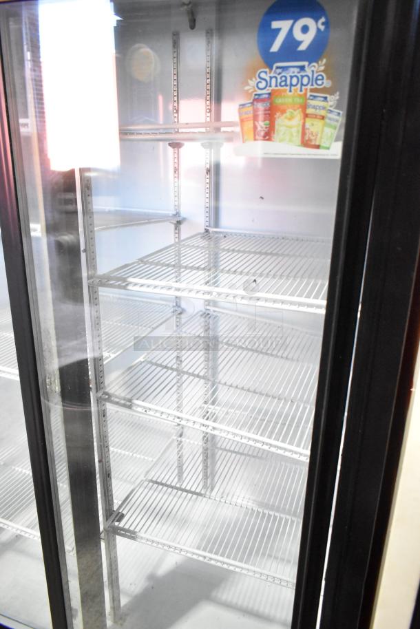 Beverage Air MT38 2-door reach-in cooler, commercial grade, with glass doors and multiple shelves. 115V, 1-phase.