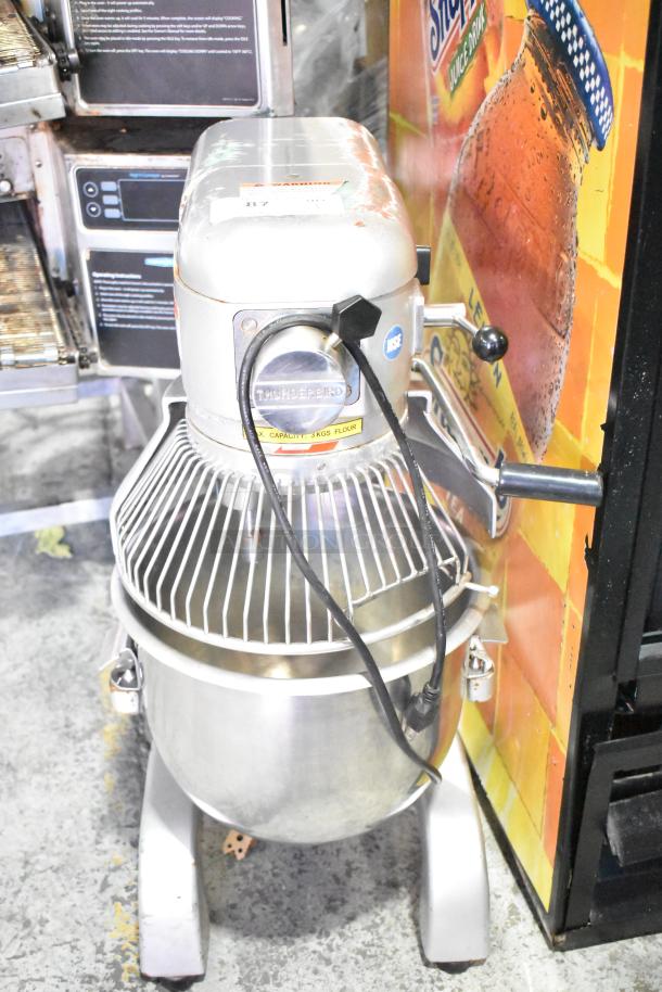Thunderbird ARM-02 20 Quart Planetary Dough Mixer with mixing bowl and bowl guard, 115V, 1 Phase, in working condition.