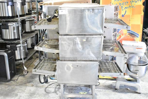 Three Turbochef HhC2020 commercial electric conveyor ovens, stainless steel, used, 208/240V, 3-phase, visible wear.