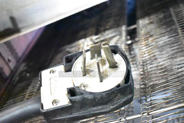 Close-up of a power plug for 2017 Turbochef HhC2020 commercial conveyor oven, 208/240V, 3 phase.