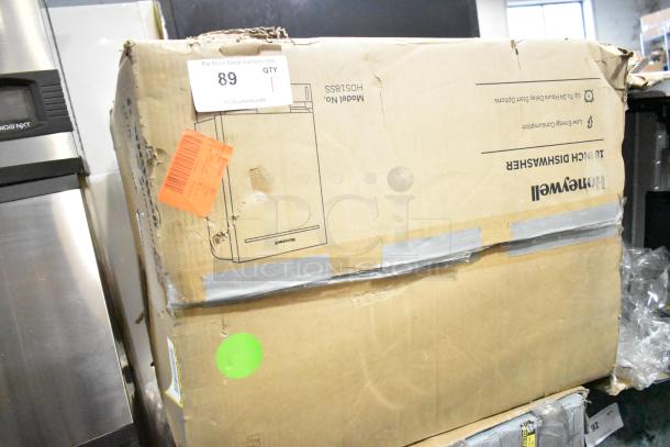 Damaged box of Honeywell HDS18SS dishwasher, 18" with 8 place settings, 6 programs, stainless steel tub. Scratch and dent condition.