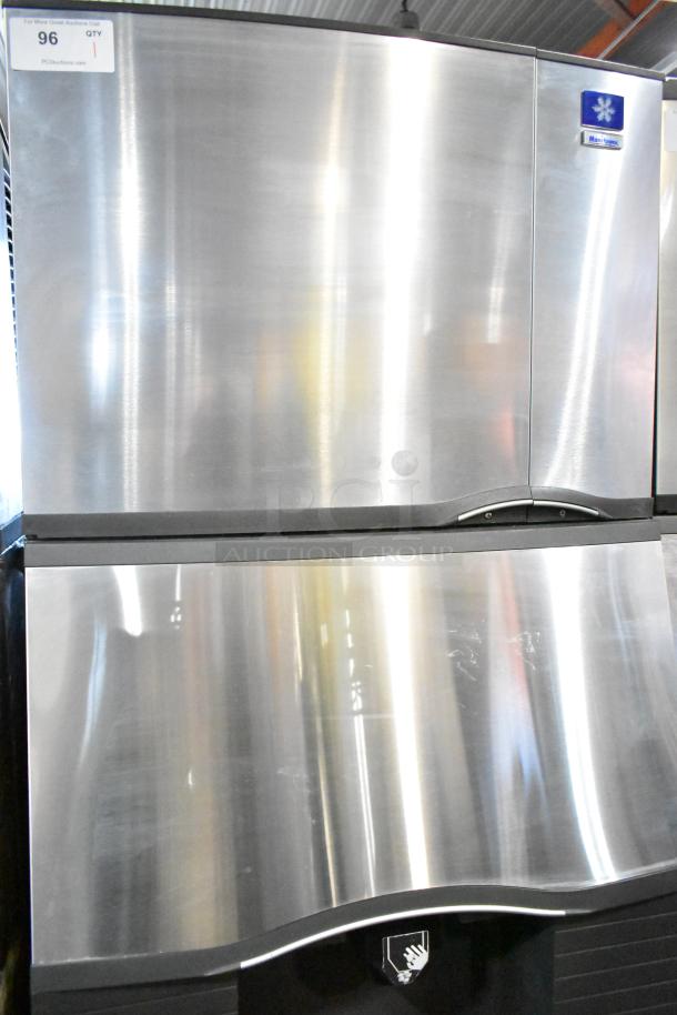 Manitowoc SD0452A ice machine head on SPA310 dispenser. 115V, 1 phase. Stainless steel, excellent condition, visible labels.