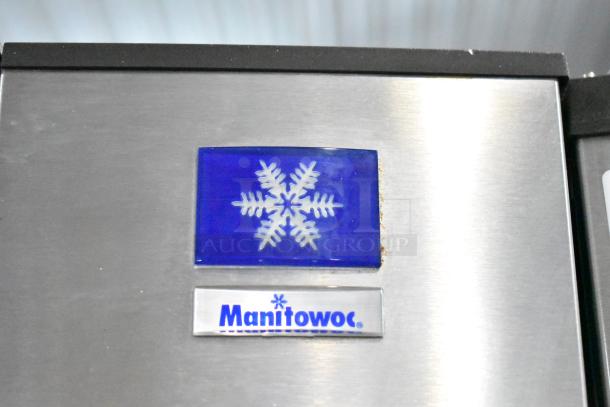 Manitowoc SD0452A ice machine head on SPA310 dispenser, stainless steel with Manitowoc logo, 115 volts, 1 phase.