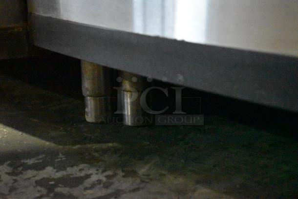 Manitowoc SD0452A ice machine head on SPA310 dispenser; commercial grade, 115V, 1 phase, visible sturdy metal base.