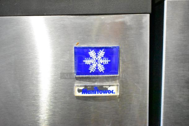 Manitowoc SD0452A ice machine head on SPA310 dispenser. Logo with snowflake decal. Stainless steel finish.