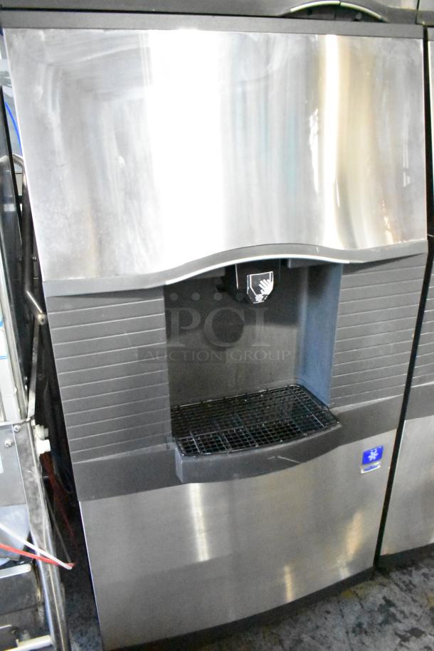Manitowoc SD0452A ice machine head on SPA310 dispenser, 115 volts, 1 phase, stainless steel, commercial use, visible logo.