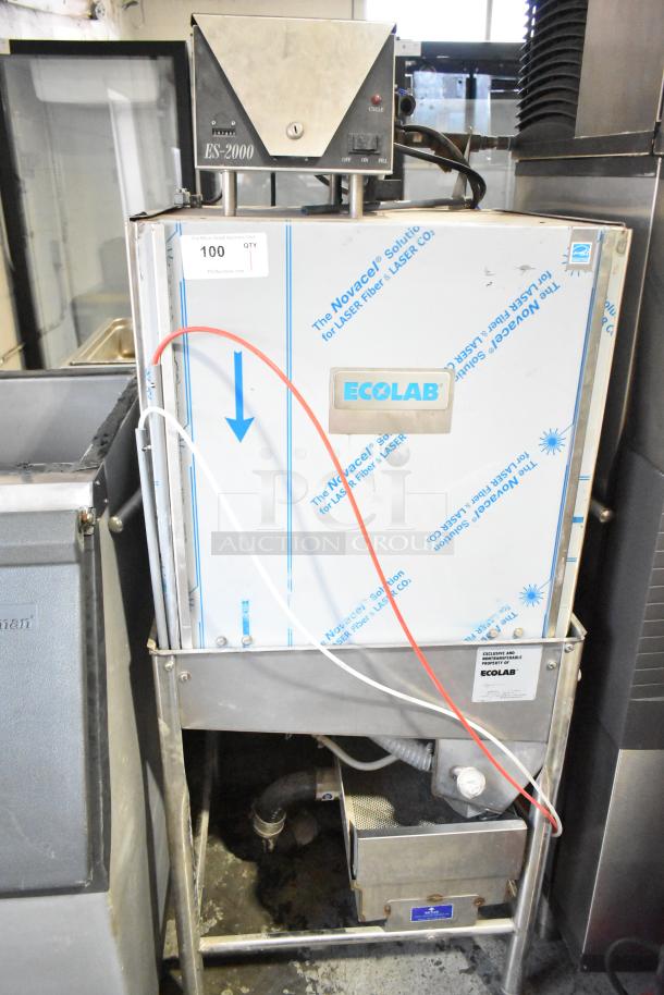 Ecolab ES-2000 Commercial Straight Pass Through Dishwasher, stainless steel, labeled panel, includes plumbing connections, model ES-2000.