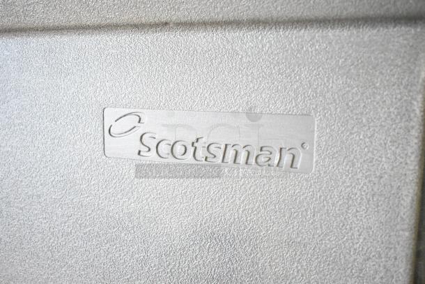 Scotsman Commercial Ice Bin with embossed brand logo. Appears in excellent condition with textured surface finish.