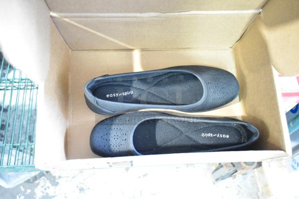 Pair of Easy Spirit ballet flat shoes in black with perforated design, new in box.