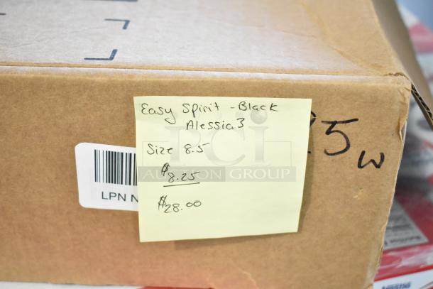 Cardboard box with a sticky note labeled "Easy Spirit - Black Alessia3, Size 8.5, $8.25/$28.00". Box part of auction lot.