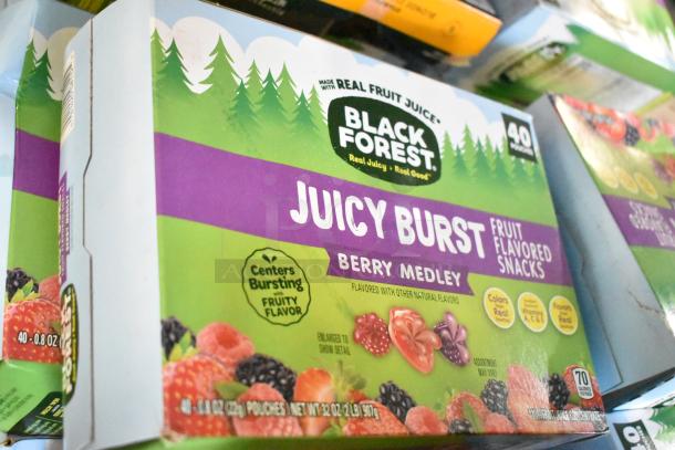Black Forest Juicy Burst berry medley gummies box, flavored with real fruit juice, 40 pouches, vibrant packaging.