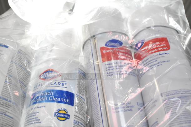 Three-tier lot with Ajax Heavy Duty Formula Cleaner, Diversey Oxivir Sanitizer. New, sealed bottles, labels visible.