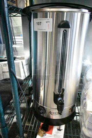 Brand new Avantco 177WB29L water boiler, 7.6 gallon capacity, 120V, with visible scratch and dent. Includes tap and temperature dial.
