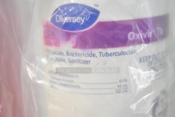 Diversey Oxivir Tb Disinfectant bottle with bactericide and sanitizer labels visible. Part of a 27-item auction lot.