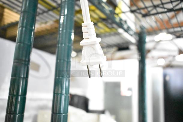 Fellowes CRC 57366 Laminator Machine plug, 120 Volts, 1 Phase, in warehouse setting.