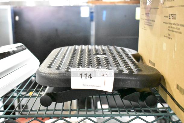 Low step stool with textured surface on metal shelving. Auction tag reads "114 QTY 1 PCIauctions.com".