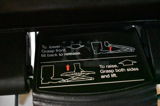 Adjustable stool mechanism with instructions; depicts steps for raising and lowering, featuring a black pedal.