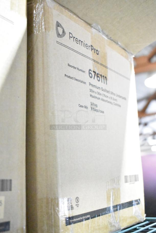 Box of PremierPro 676111 Disposable Underpads, 30x36", heavy absorbency, new condition, labeled with reorder number.