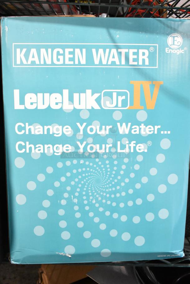 Brand new Kangen Water Leveluk Jr IV TYH-251 box with minor scratches. Blue packaging, slogan "Change Your Water... Change Your Life."