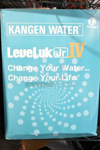 Brand new Kangen Water Leveluk Jr IV TYH-251 box with minor scratches. Blue packaging, slogan "Change Your Water... Change Your Life."