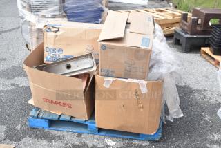 Cardboard boxes with Dixie Ultra 32006 labeling, containing various brand new scratch and dent items, on a pallet.