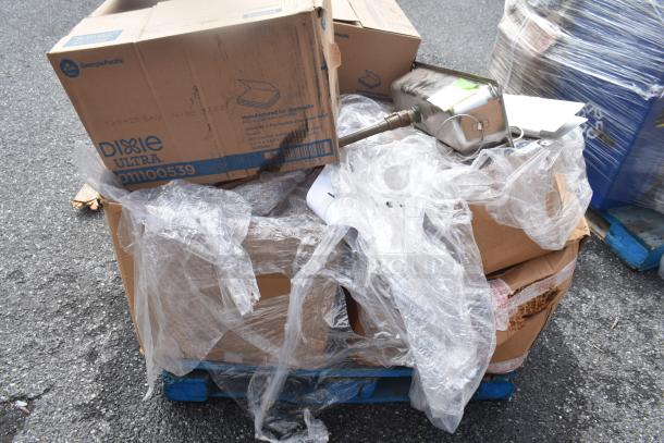 Pallet of 15 brand new scratch and dent items, including Dixie Ultra 32006 boxes. Items are wrapped in plastic.