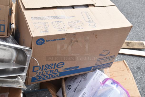 Box of Georgia-Pacific Dixie Ultra 32006, brand new scratch and dent condition, part of auction lot including various items.