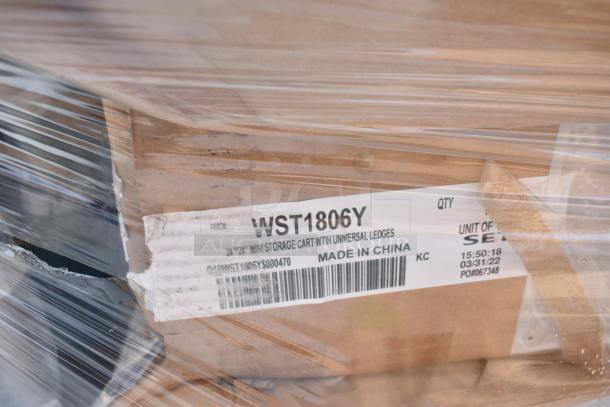 Stack of boxed items wrapped in plastic, labeled "WST1806Y" and "Made in China." Items include storage carts.