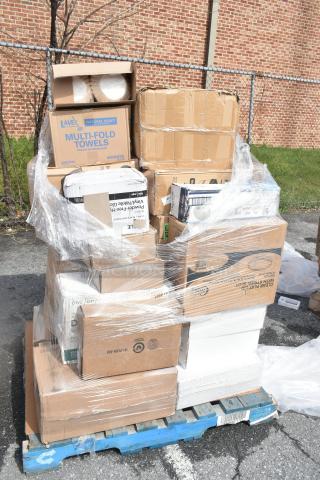 Shrink-wrapped pallet of 22 mixed boxed items, including Lavex Multi-Fold Towels, trash bags, and cling film, marked as scratch and dent.