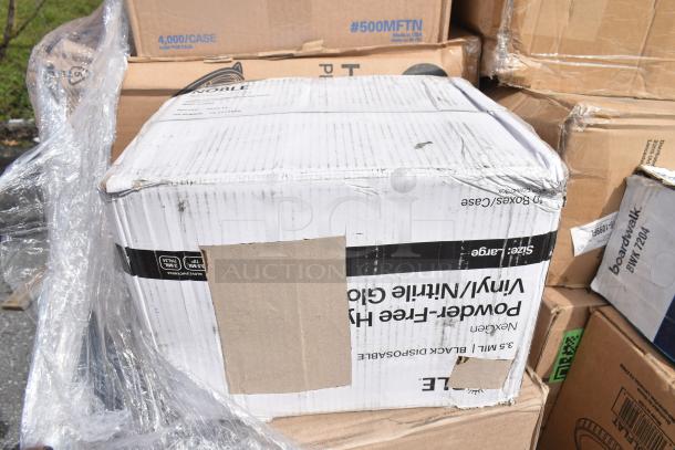 Boxes of brand new scratch-and-dent items including trash bags and cling film. Visible wear on packaging.