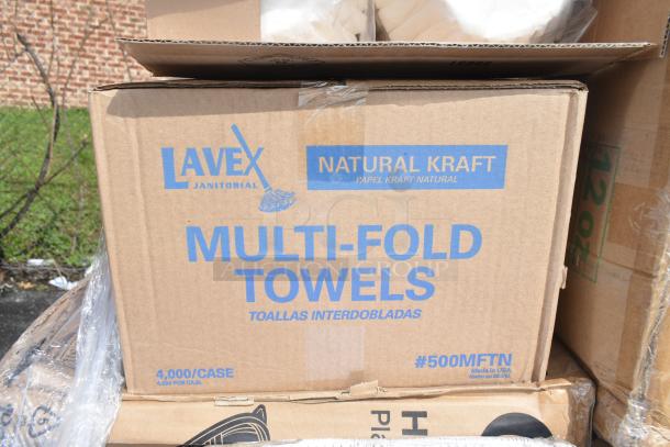 Cardboard box labeled "Lavex Janitorial Multi-Fold Towels," 4,000 count, natural kraft. Box is intact with minimal wear.