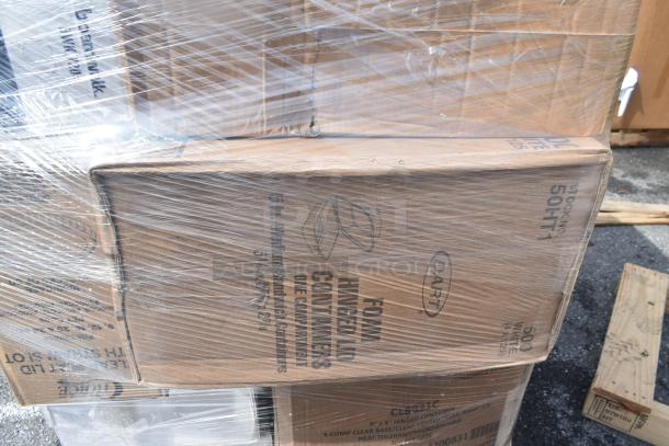 Boxes wrapped in plastic containing scratch and dent items like trash bags and hot cups. Visible label shows "Dart Foam Hinged Lid Containers."