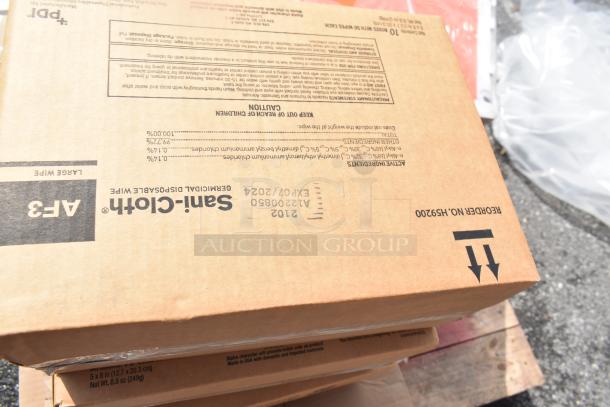 Cardboard box of Sani-Cloth Large Germicidal Disposable Wipes, new, with markings indicating AF3 wipes and expiration 07/2024.