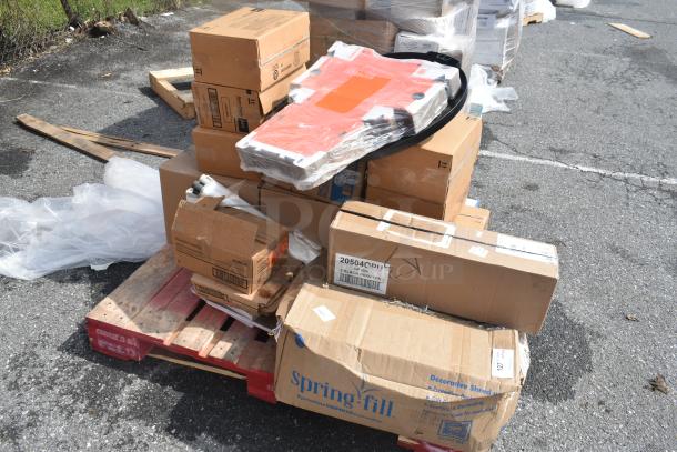 24 brand new scratch and dent items including Health Guards KL260, Sani-Cloth wipes, stacked on a pallet.