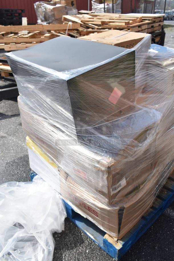 Plastic-wrapped pallet with filing cabinet, paper reams, and Zebra label printers, mixed condition, scratch and dent.