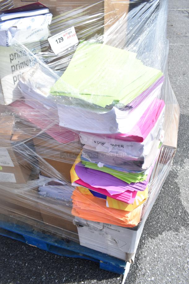 20 scratch-and-dent items: filing cabinet, assorted colored paper reams, Zebra label printers. Wrapped on a pallet.