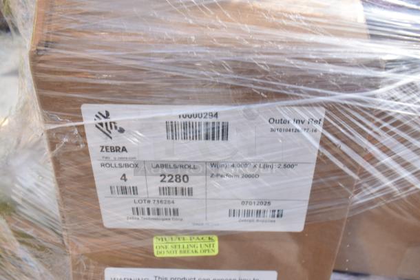 Shrink-wrapped box labeled Zebra, containing 4 rolls of 2280 labels each. Part of a scratch and dent auction lot.