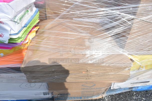 Bundle of 20 scratch and dent items including filing cabinet, colored paper reams, Zebra label printers, wrapped in plastic.