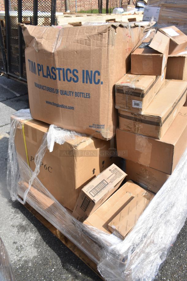 Pallet with 31 new scratch and dent items including ladles, plates, tape dispenser. Boxes marked "TIM PLASTICS INC."