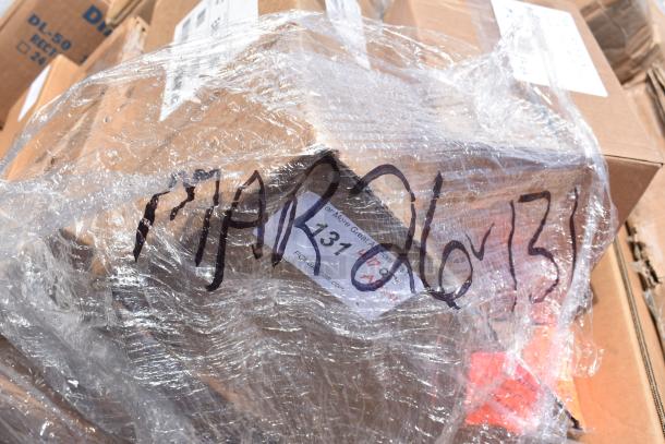 Pallet wrapped in plastic displaying auction lot number MAR26-131 for 31 new scratch and dent items.