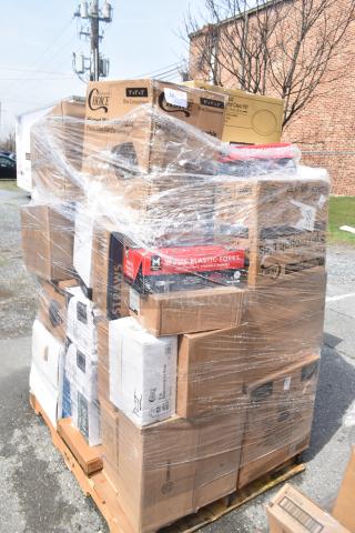 Pallet of 36 assorted boxes, including plates, meat trays, toilet paper, knives. Some scratch and dent items, wrapped in plastic.