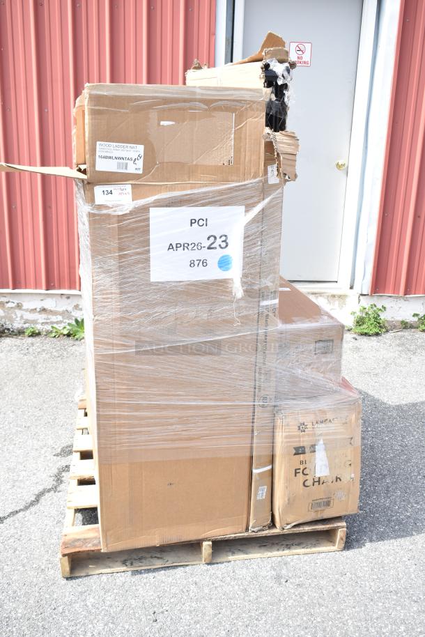 Pallet with five boxed items labeled "APR26-23" including chairs, wrapped in plastic, some damage visible.